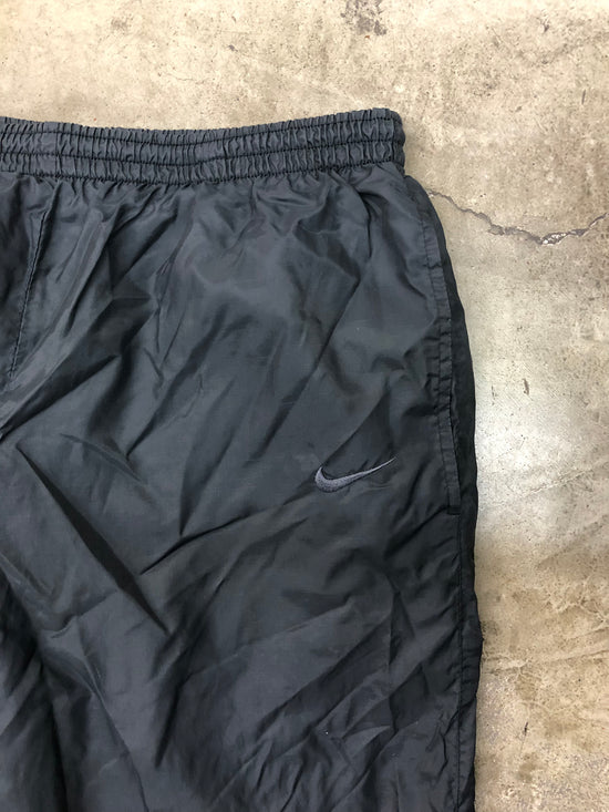 Load image into Gallery viewer, VTG Nike Nylon Track Pant Sz M 32x31
