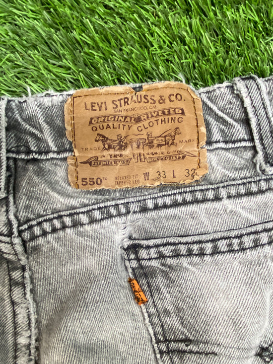 Load image into Gallery viewer, VTG Levi Orange Tab Grey Ripped Jeans Sz 33x32
